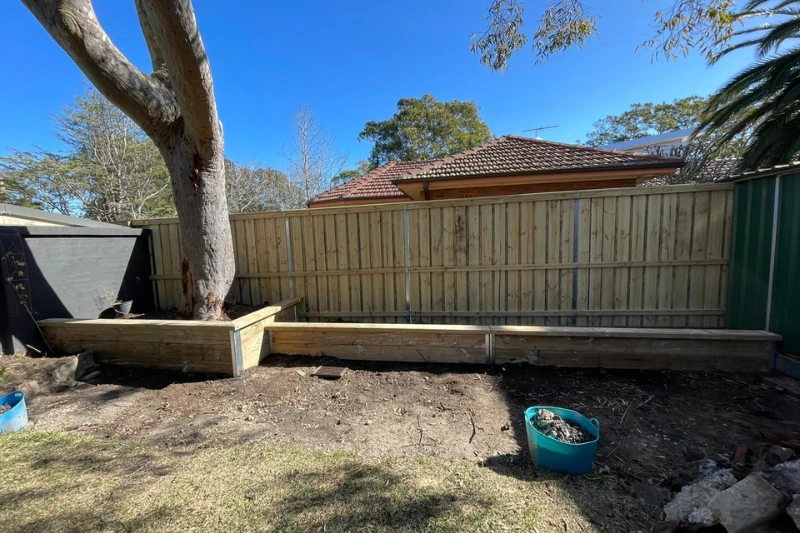 Timber sleeper retaining walls construction for property structural support — Muller's Fencing Sydney